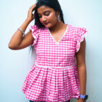 Elegant pink short kurti with a chic design, ideal for college and daily wear.