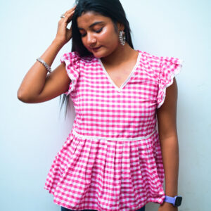 Elegant pink short kurti with a chic design, ideal for college and daily wear.