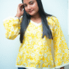 trendy yellow short kurti with lace and floral prints