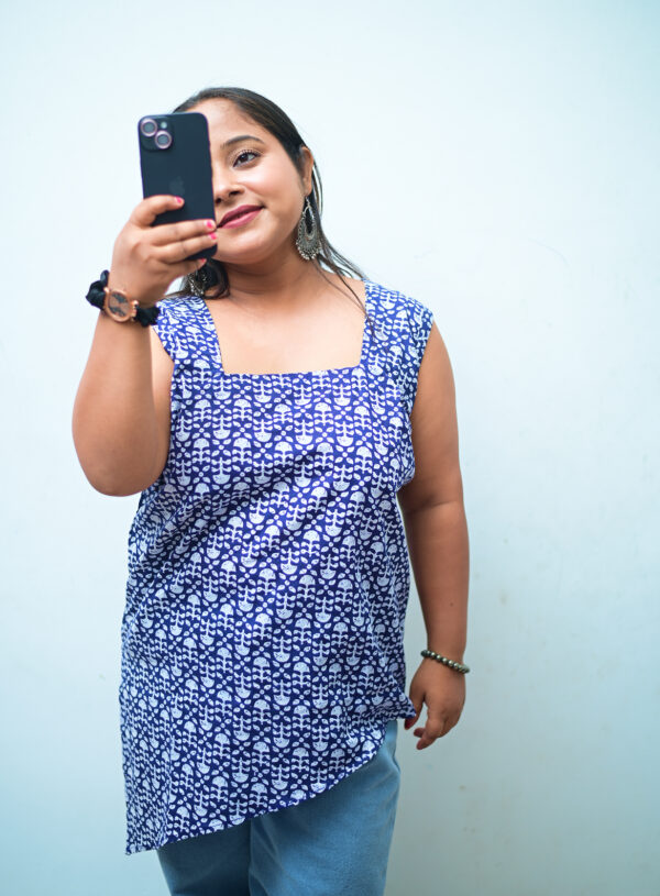 Desi Diva short kurti in sleeveless cotton style for casual wear.
